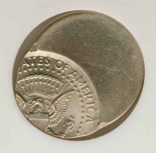 2012 Kennedy half dollar off-center strike error showing blank crescent area and shifted portrait design