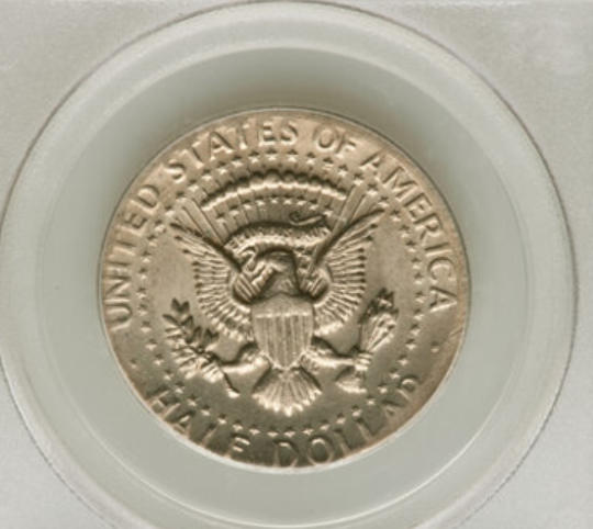 2012 Kennedy half dollar wrong planchet error showing the half dollar design struck on a planchet intended for a different denomination